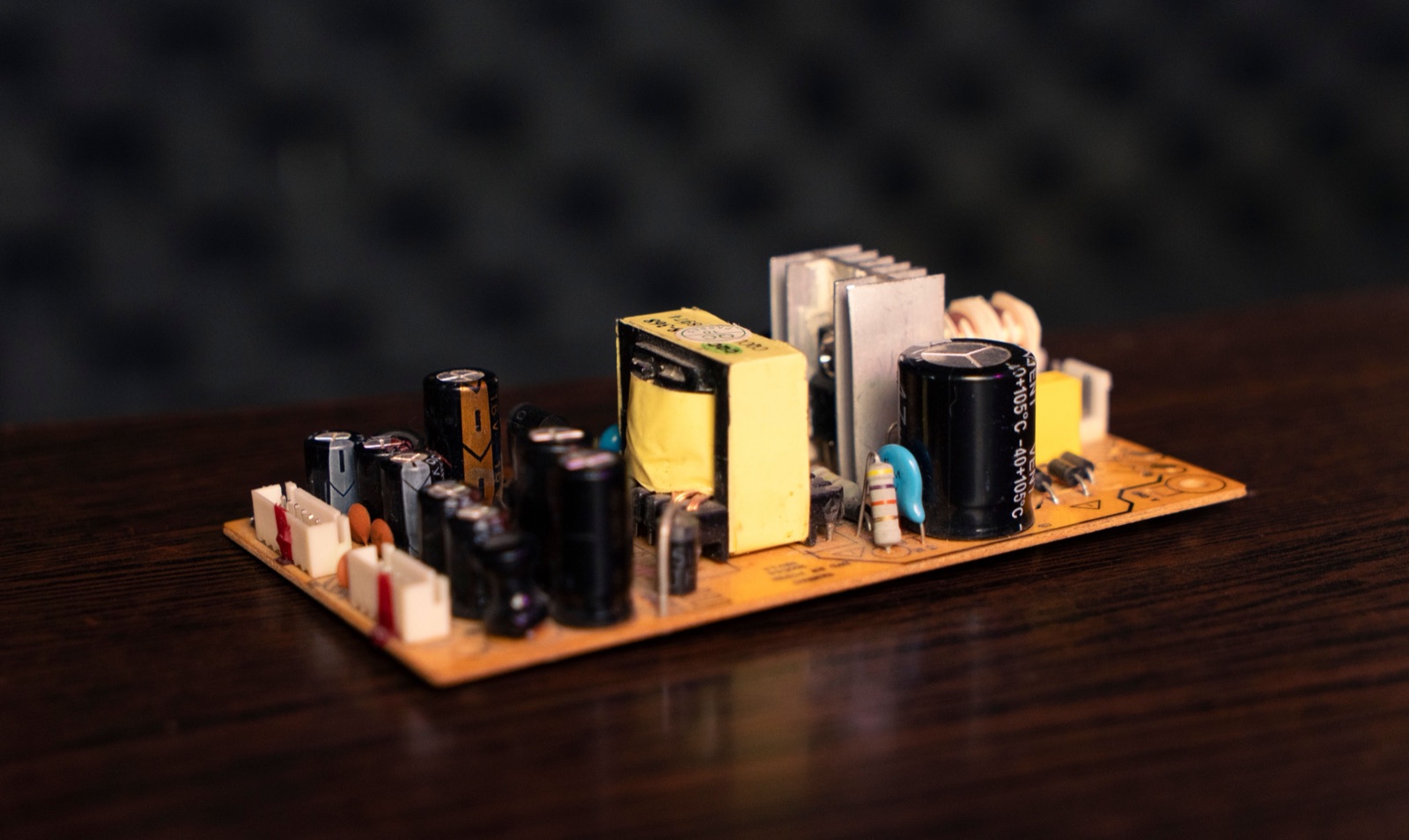 Macro photograph of an electronic circuit board used as an editorial illustration for FCC equipment authorization.